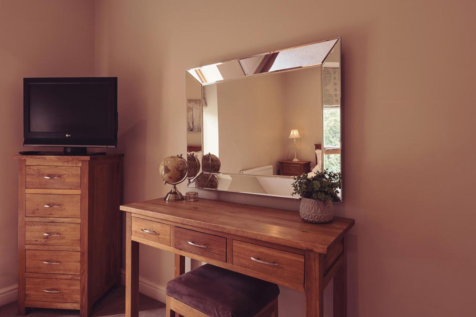 长岛酒店及别墅 康福斯 外观 照片 A dressing table with a mirror